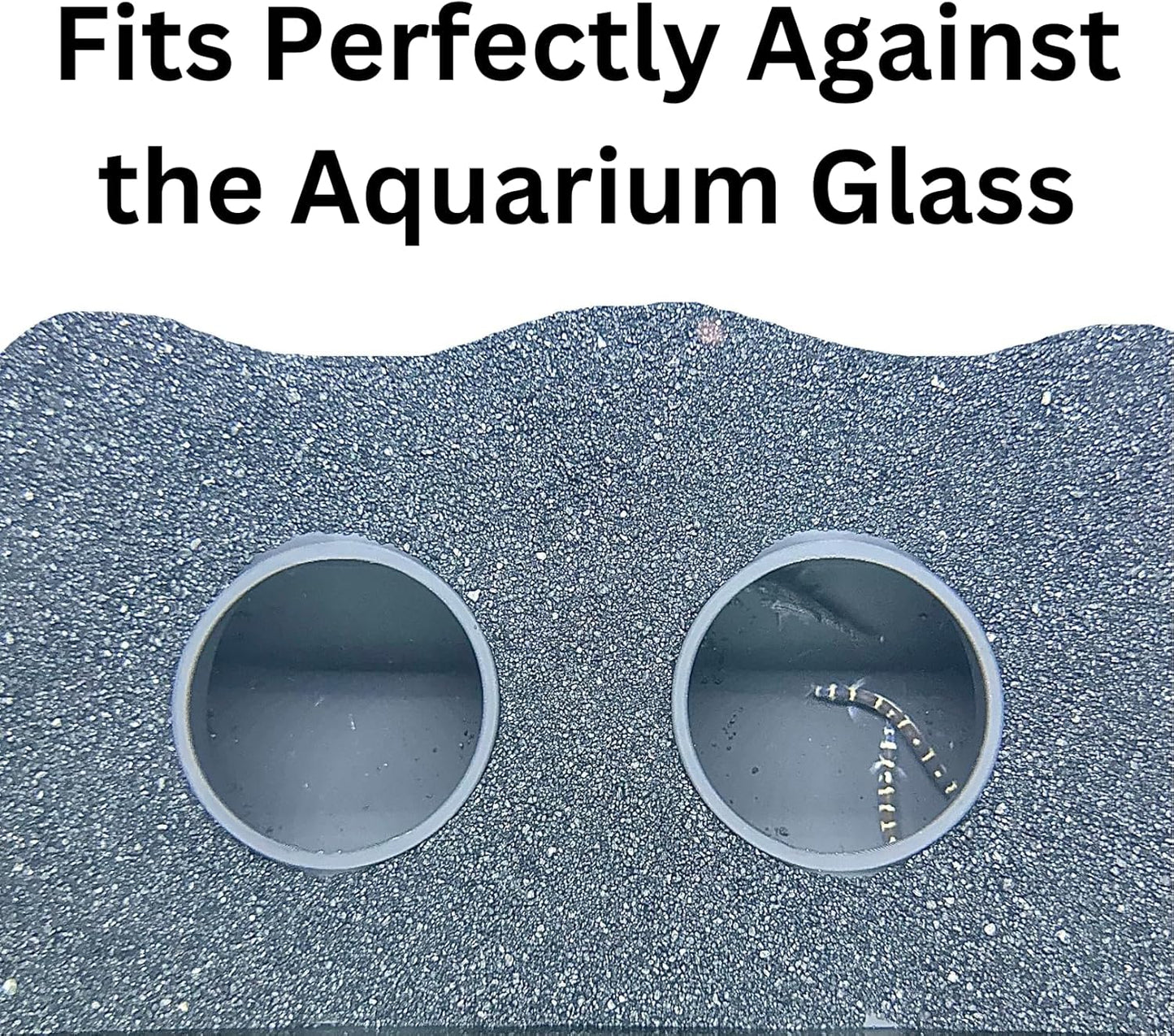 Aquarium cave underground against the fish tank glass to show how it sits under gravel